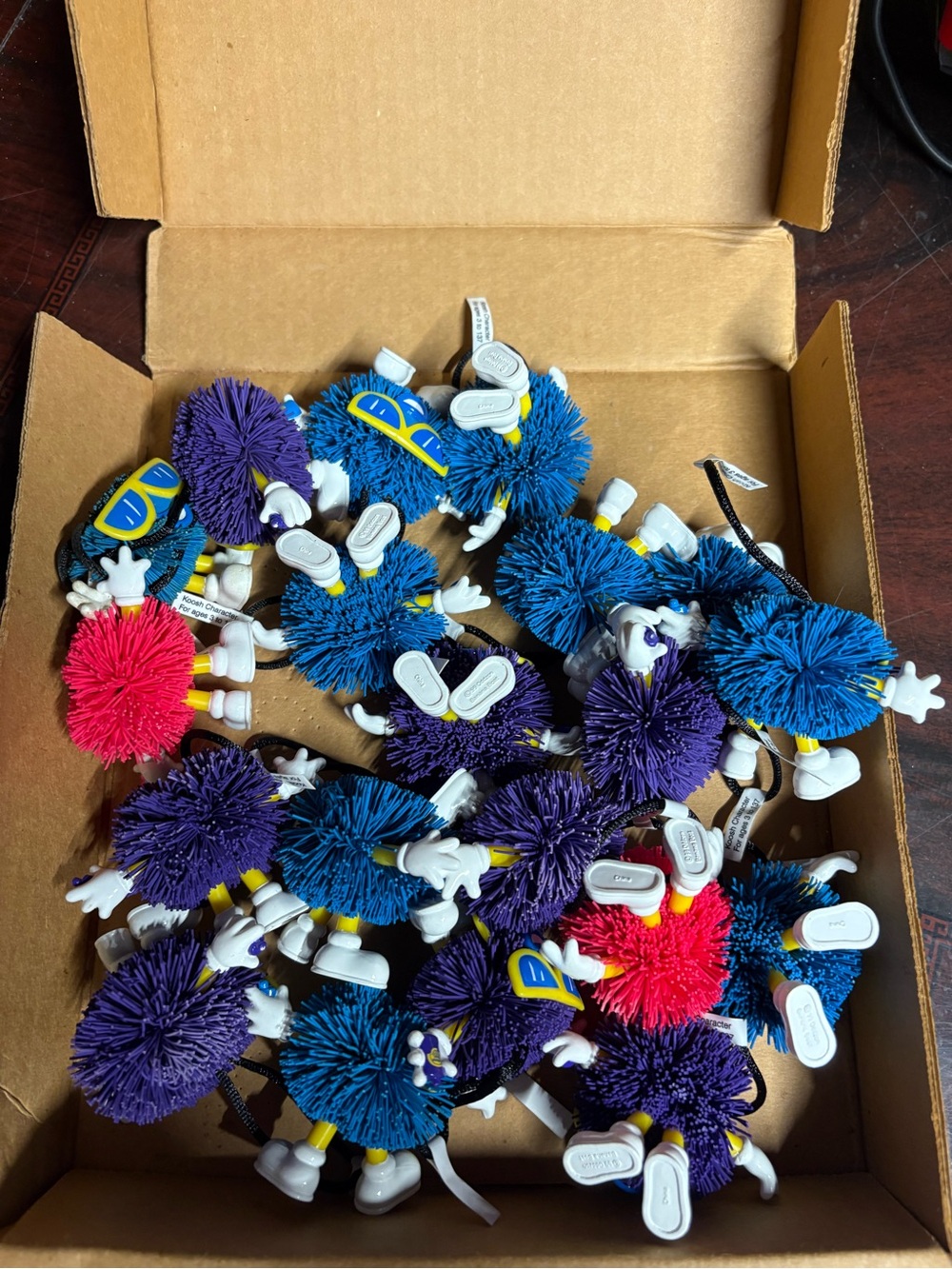 Box of 20 Koosh Y2K Vintage Pom-Pom Character Keychains - Hawaiian Tropic